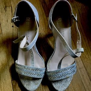 Woman’s high heel shoes. Beautiful! Worn briefly to 2 proms. Size 7.5